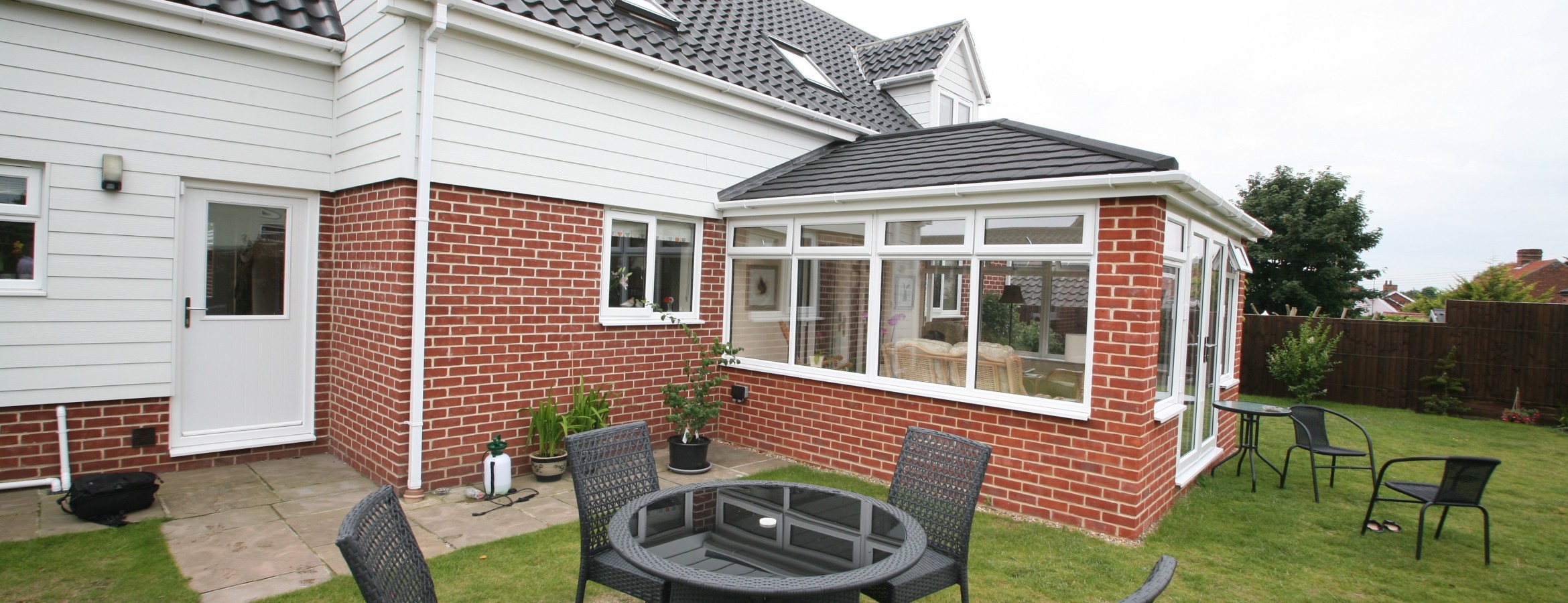 Conservatory with an insulated roof